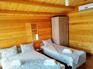 Гостевой дом Гостевые домики Псырцха Новый Афон Трехместный номер с душем-14